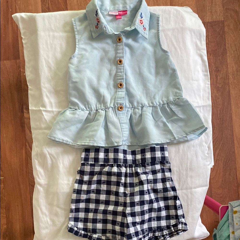 Penelope Mack Light Blue Top with Pink Accents with blue and white shorts